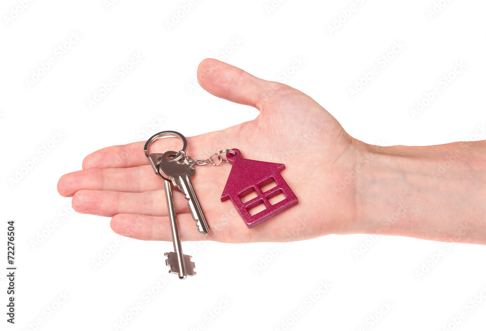 House keys in hand isolated on white background House keys in hand isolated on white background
