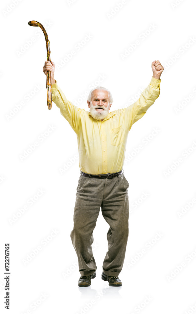 Happy old bearded man jumping