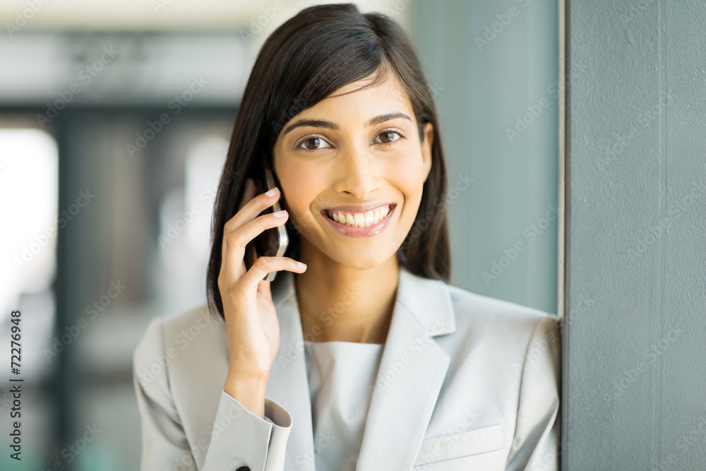 indian business woman talking on cell phone indian business woman talking on cell phone