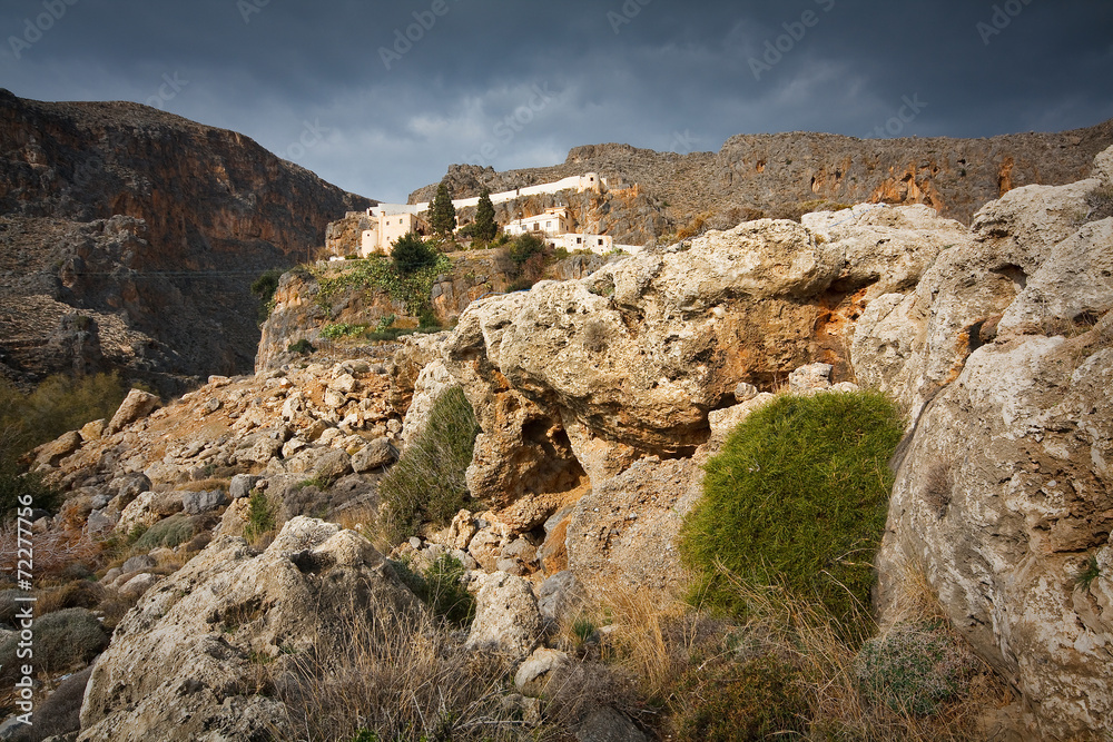 Monastery and a gorge in mountains of Crete, Greece.