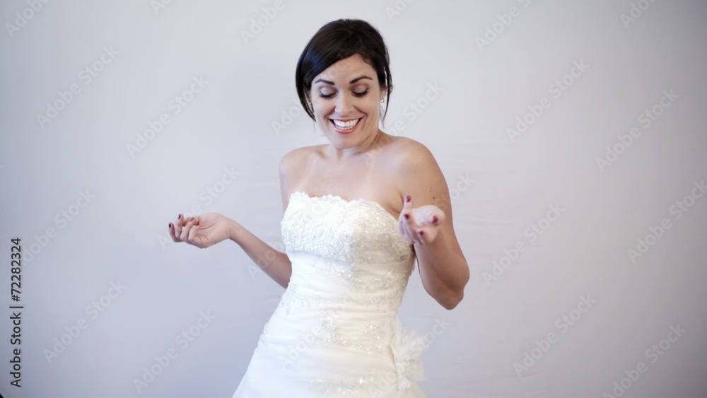Beautiful Bride to be Smiling & Dancing on her Wedding Dress Beautiful Bride to be Smiling & Dancing on her Wedding Dress