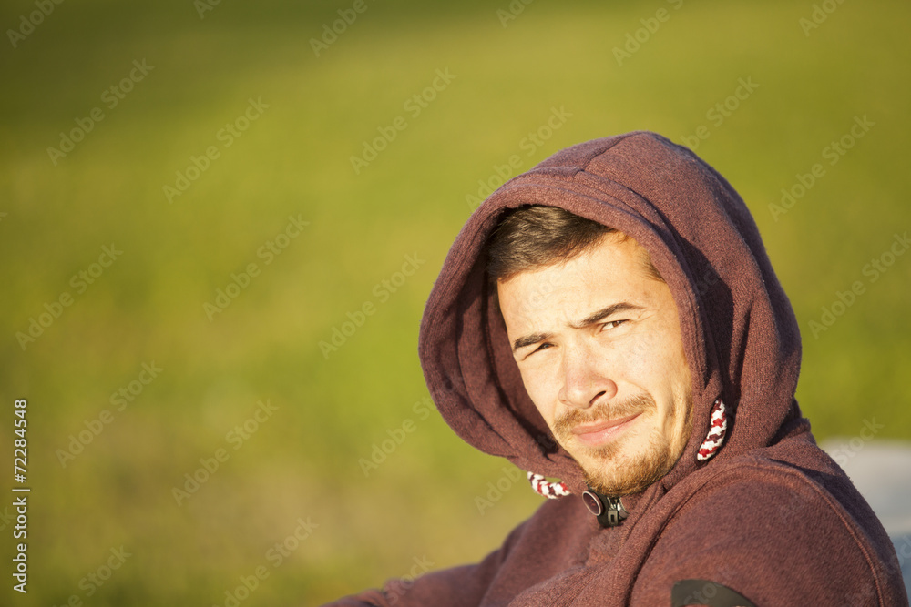 Portrait Of A Young Attractive Man In Hoodie