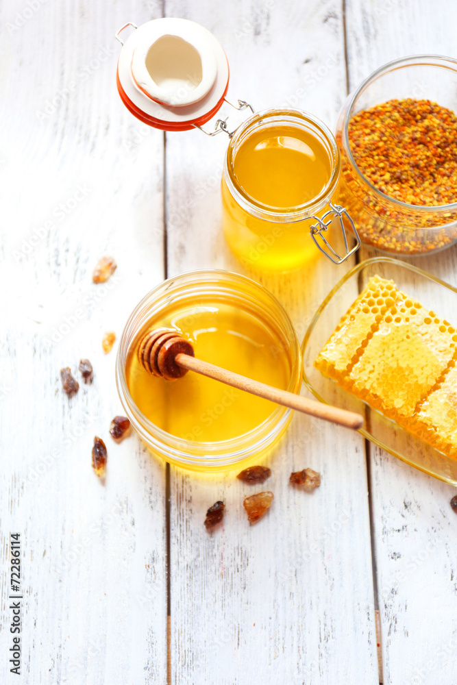 Fresh honey on wooden table Fresh honey on wooden table