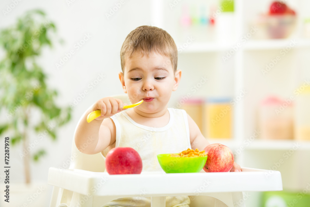 funny kid eating healthy food indoor funny kid eating healthy food indoor