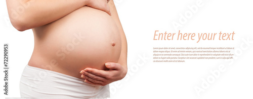 Photo belly of a pregnant woman isolated