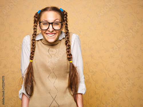 Portrait of young female nerd photo