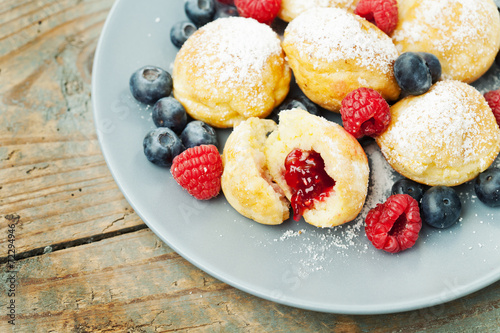 Traditional danish pancakes - ebelskivers with fresh berries