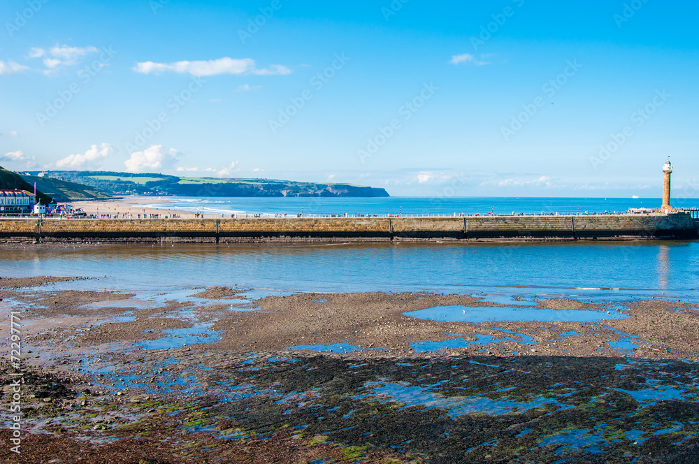 Scenic view of Whitby Pier in autumn sunny  day