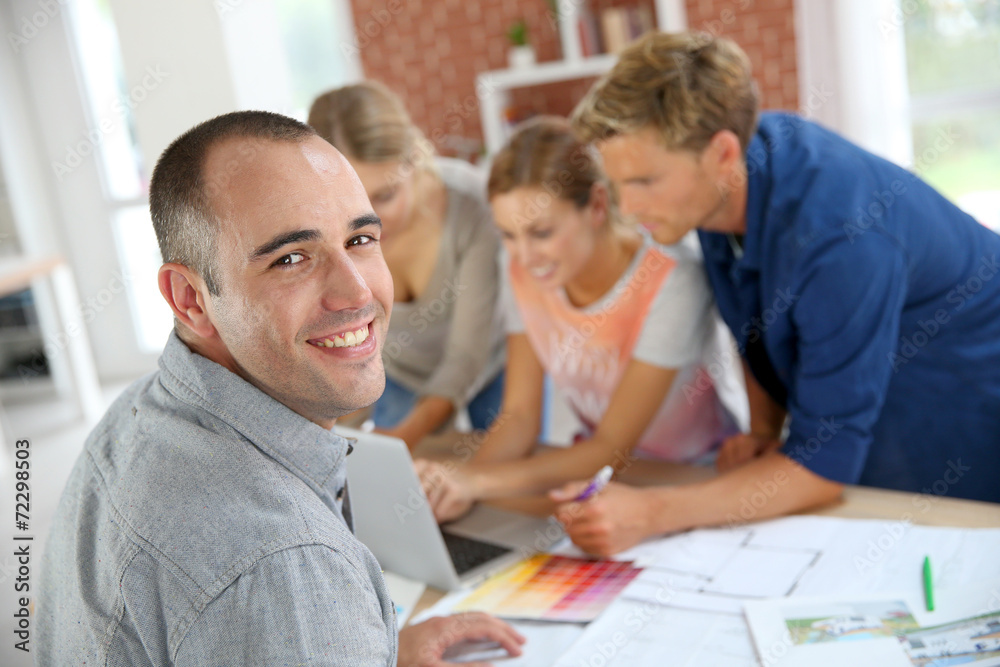 Fototapeta premium Group of students working on construction project