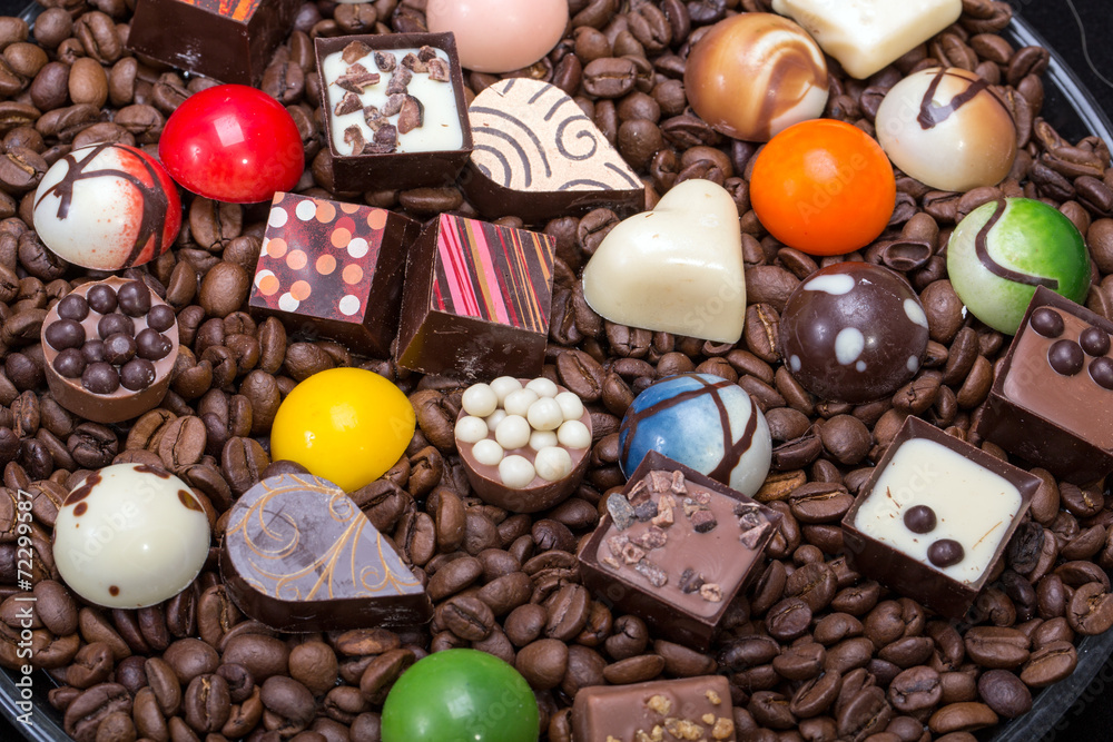 Set of a various chocolate pralines and coffee beans