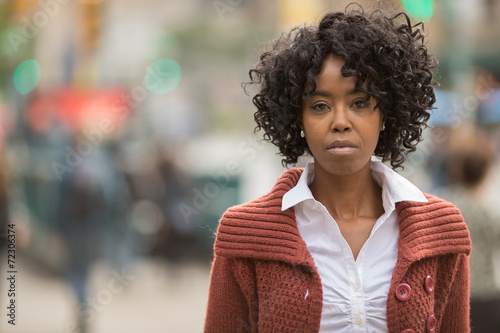 African American black woman in city serious face photo