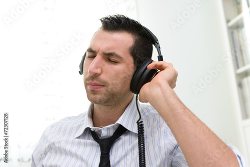 Businessman with headphone photo