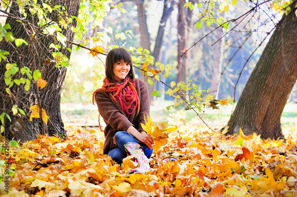 Woman relaxing in the forest, autumn outdoor. Woman relaxing in the forest, autumn outdoor.
