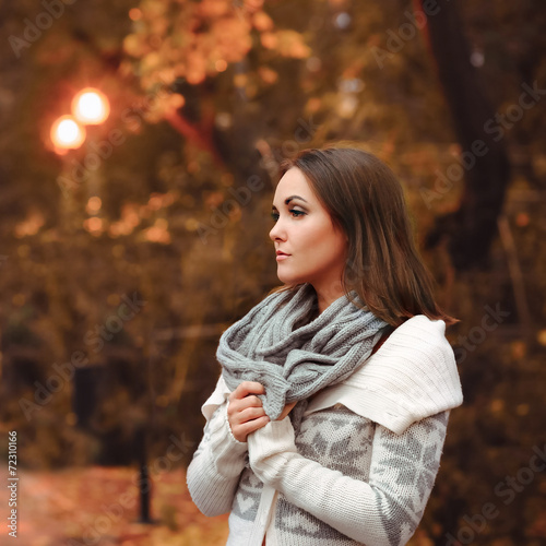 Young woman portrait autumn evening.
