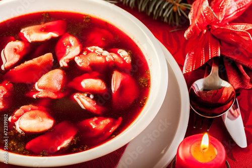 Christmas red borscht with meat filled dumplings photo