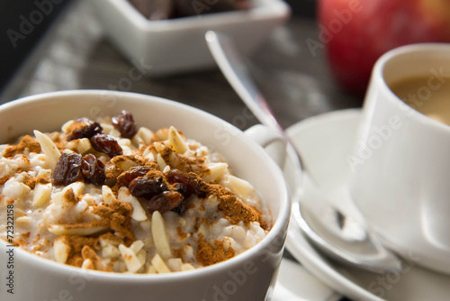 coffee and oatmeal with dried fruit healthy breakfast setting