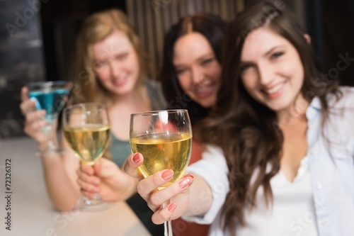 Pretty friends meeting up for a drink