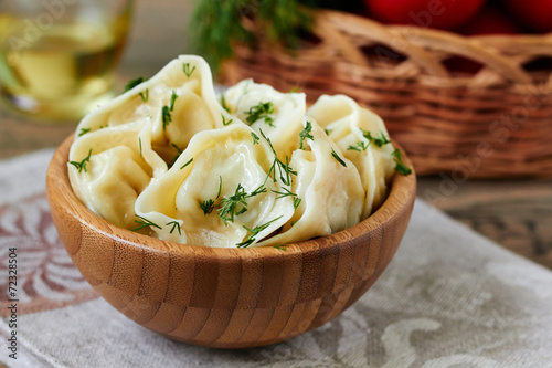 Meat dumplings. Russian traditional pelmeni with meat