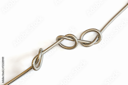 flexible metal hose with three knots