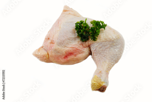 Fresh Parsly on Top of an Organic Chicken Leg Qarter