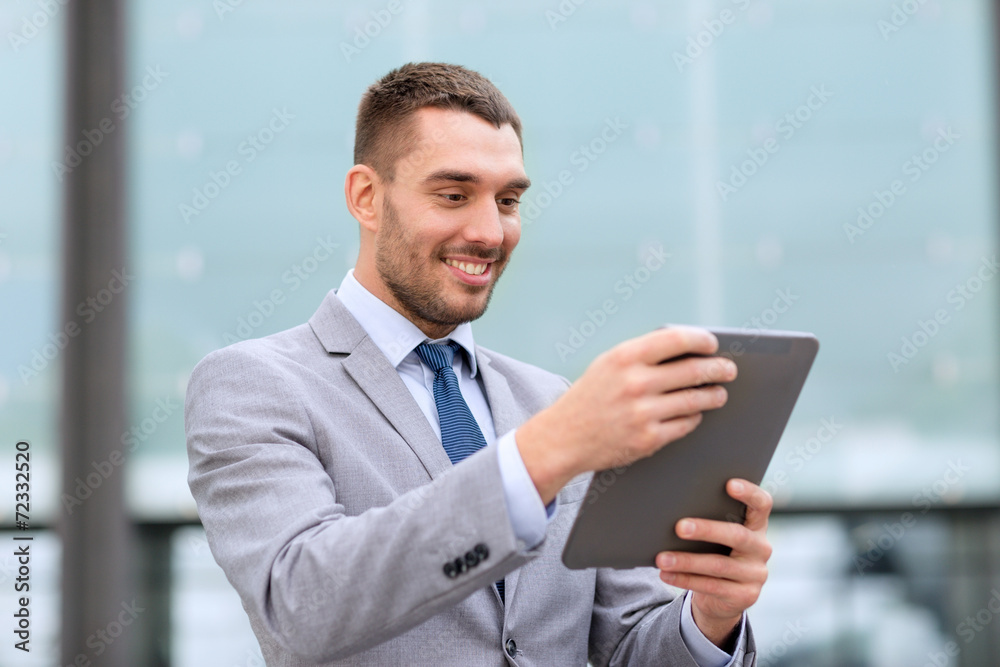 smiling businessman with tablet pc outdoors smiling businessman with tablet pc outdoors