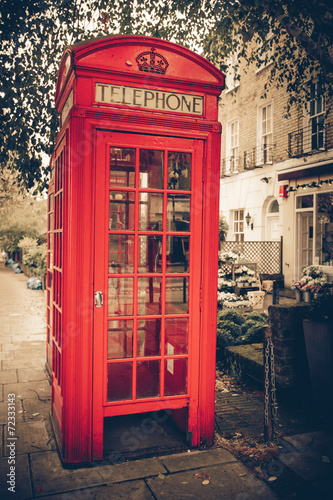 Vintage tone red London telephone booth #72333143