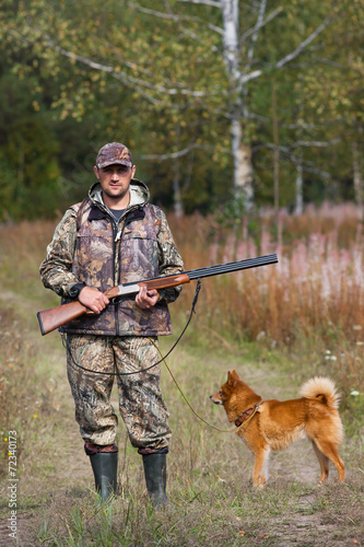 hunter and dog outdoors