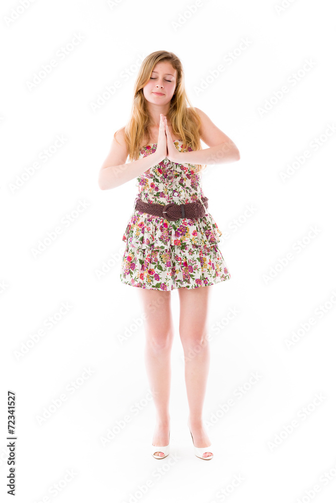 model isolated on plain background praying wishing