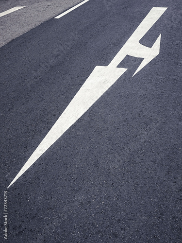 Arrow Traffic sign on Road © VTT Studio