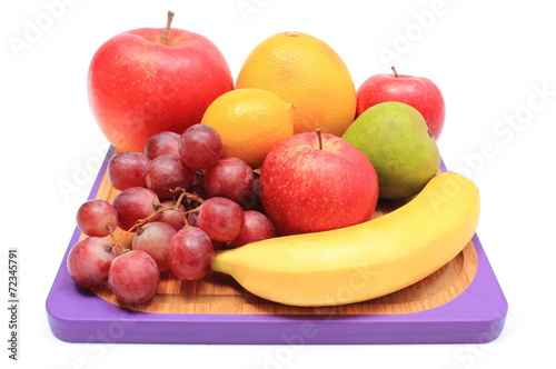 Fresh natural fruits on cutting board