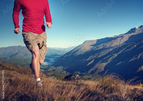 Man Jogging Mountains Exercise Wellbeing Concept photo