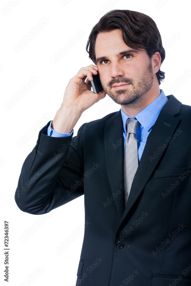 Stylish businessman talking on his mobile phone Stylish businessman talking on his mobile phone