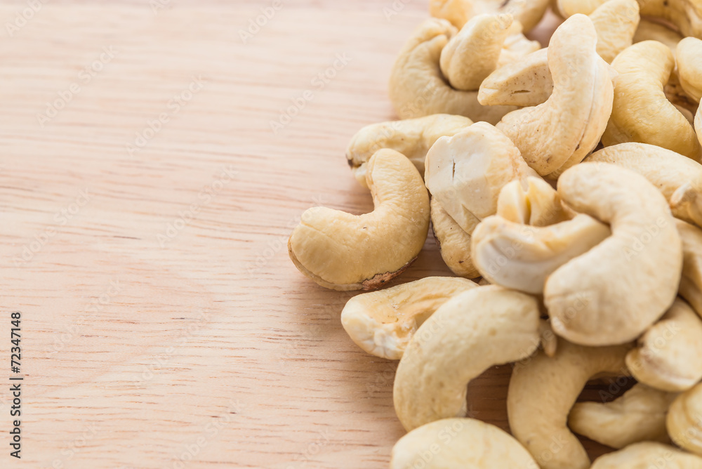 cashew on wood background cashew on wood background