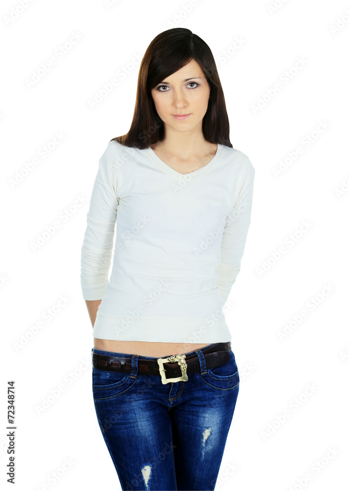 young woman in jeans and blouse posing on white background young woman in jeans and blouse posing on white background