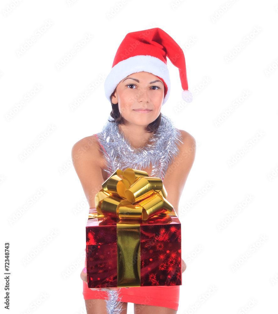 Beautiful christmas woman in santa hat holding gift Beautiful christmas woman in santa hat holding gift