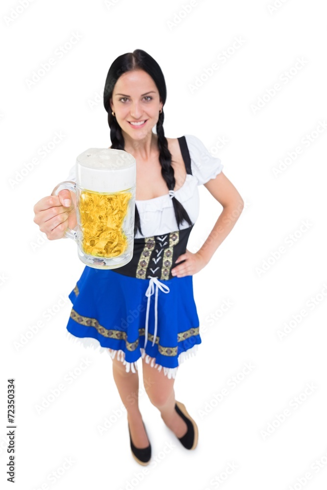 Pretty oktoberfest girl holding beer tankard Pretty oktoberfest girl holding beer tankard