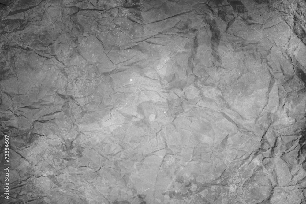 Naklejka premium gray wrinkled sheet of paper