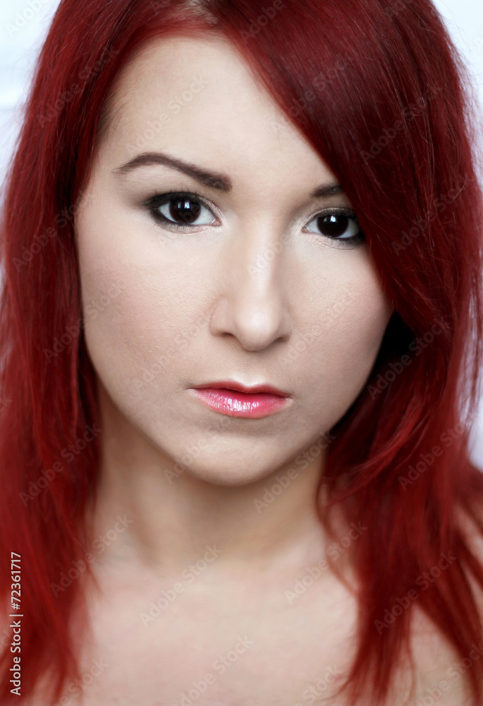 Beautiful redhead young woman with bright make up portrait Beautiful redhead young woman with bright make up portrait
