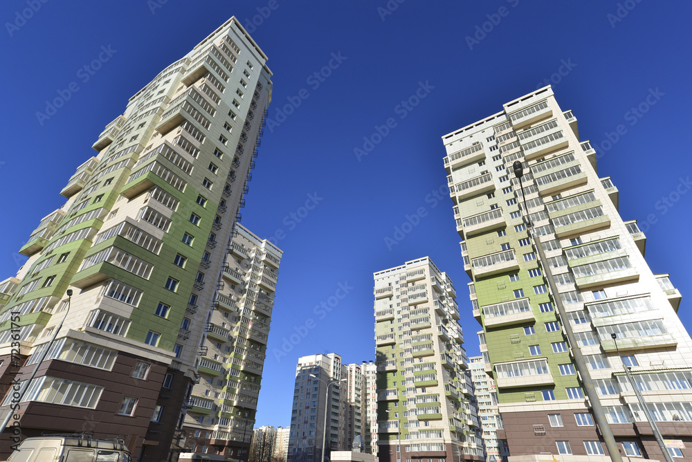 High residential buildings on the background of  blue sky