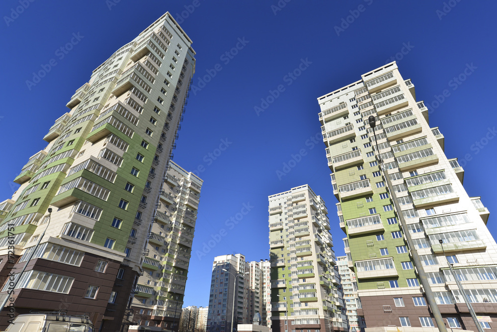 High residential buildings on the background of blue sky High residential buildings on the background of blue sky