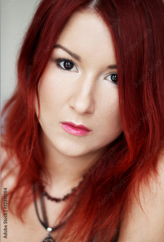 Beautiful redhead young woman with bright make up portrait Beautiful redhead young woman with bright make up portrait