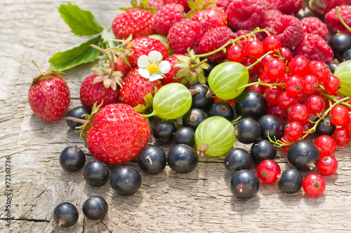 Berries on wooden background