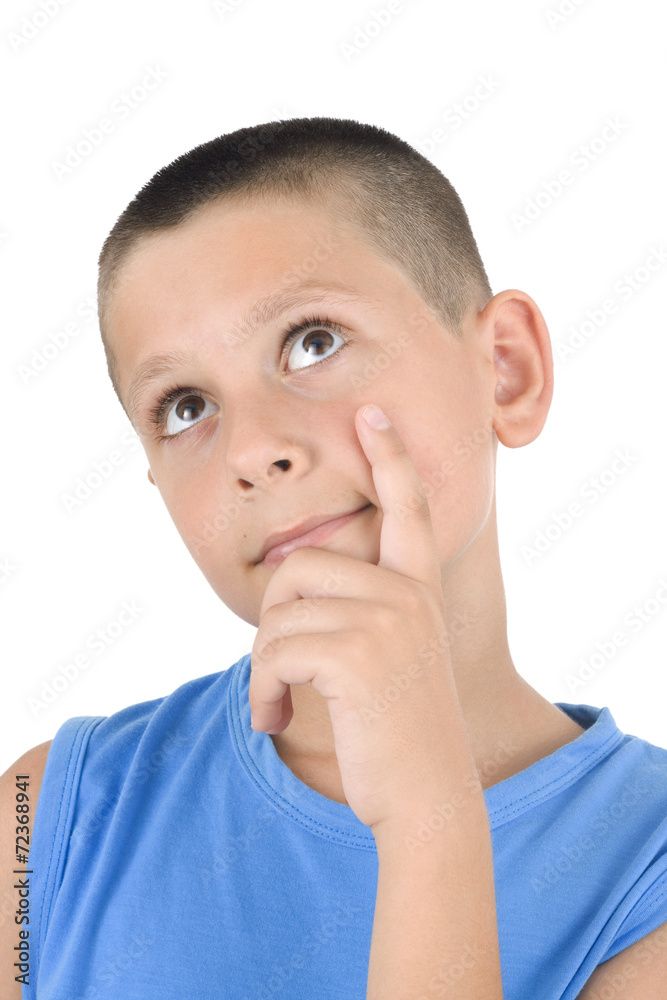 Young boy with a pensive expression Young boy with a pensive expression