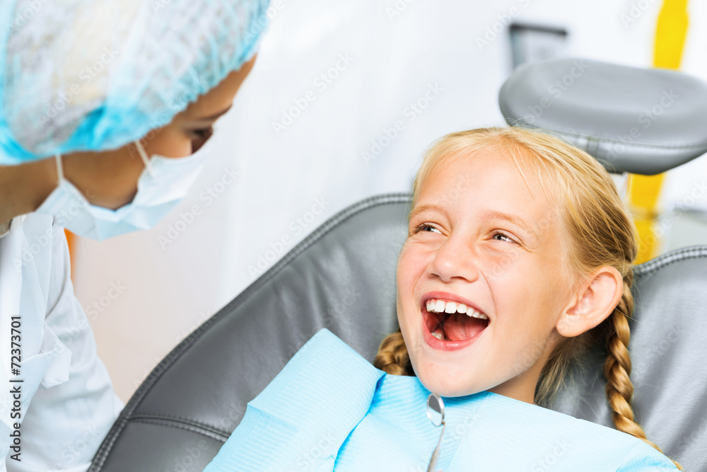 Dentist inspecting patient Dentist inspecting patient