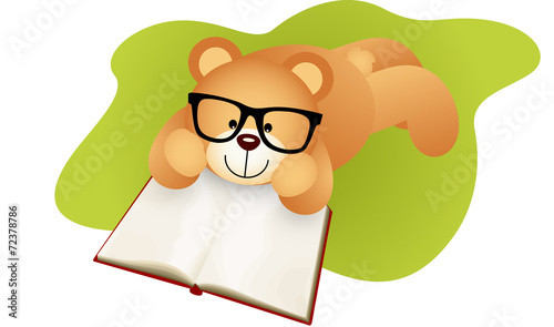 Teddy bear lying down reading a book