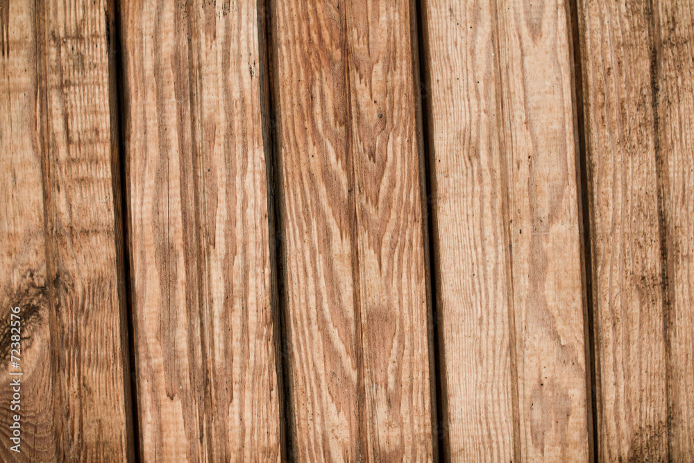 Wooden surface made with brown desks texture. 
