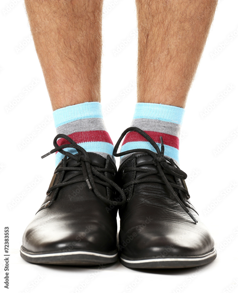 Man leg in suit and colorful socks, isolated on white