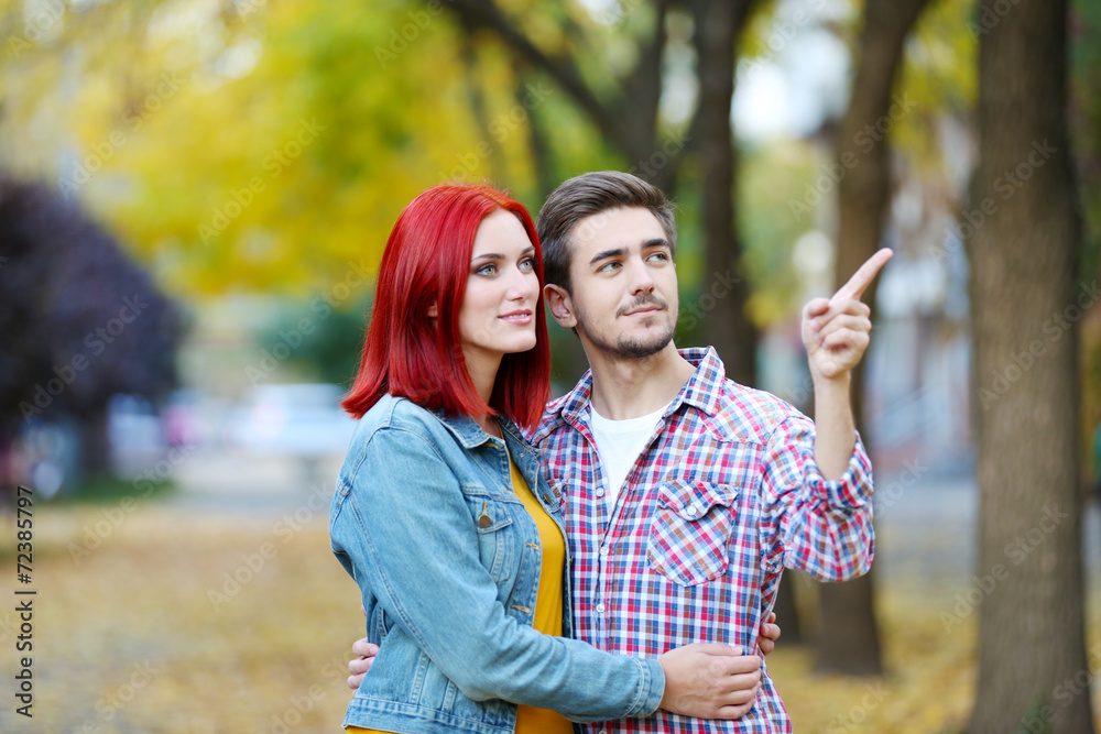 Fototapeta premium Loving couple in autumn park