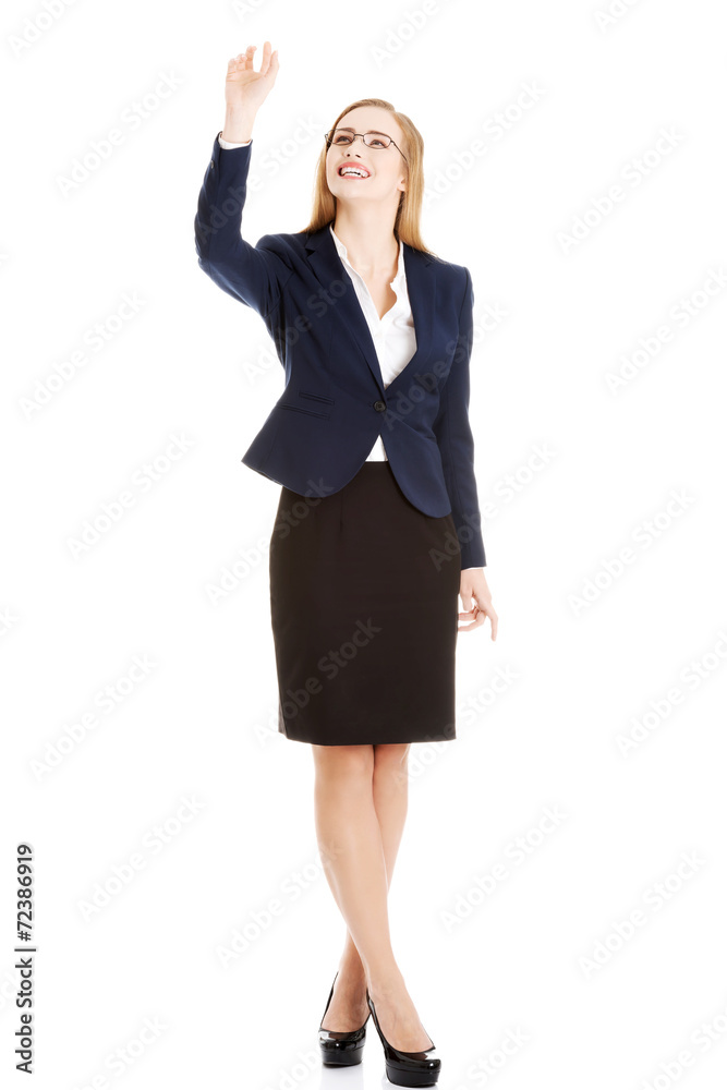 Businesswoman catching something Businesswoman catching something