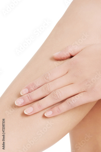Nude woman s leg